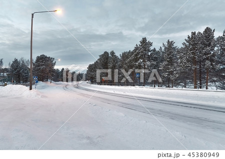 Snowy winter road 45380949