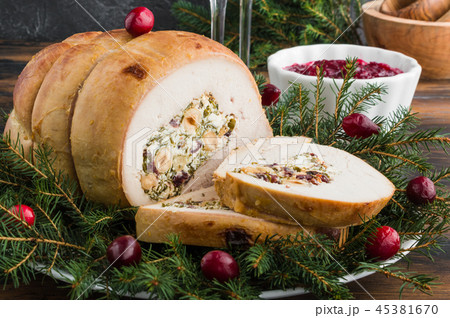 Baked turkey breast roll stuffed with feta cheese 45381670