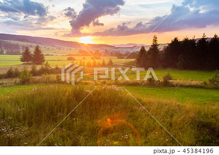 Countryside summer landscape with sunset 45384196