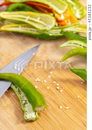 cook cutting hot peppers cook cutting hot peppers 45385232