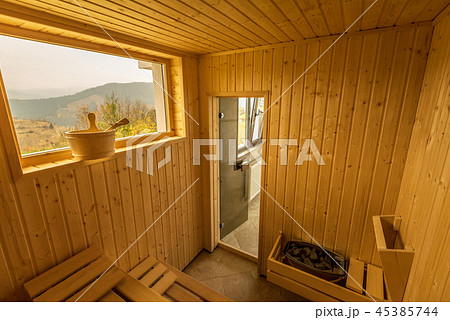 Interior of a wooden finnish sauna. 45385744