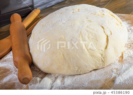 bread dough on a cutting board bread dough on a cutting board 45386190
