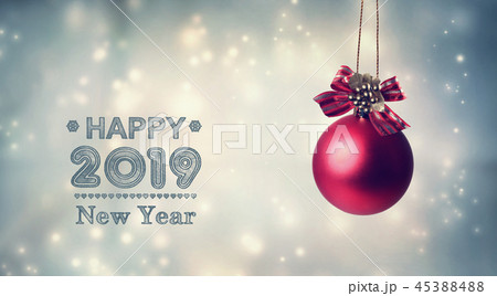 Happy New Year 2019 message with a hanging bauble Happy New Year 2019 message with a hanging bauble 45388488