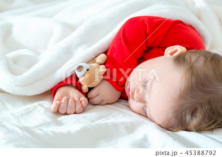Toddler boy sleeping 45388792