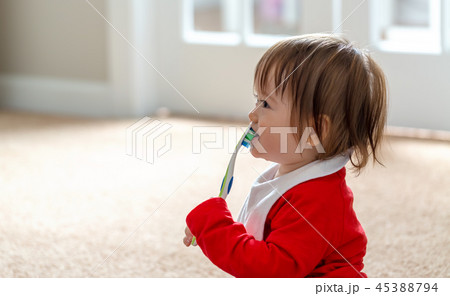 Toddler boy brushing his teeth 45388794