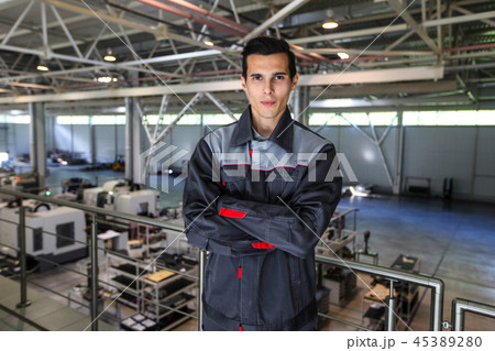 Worker at CNC factory 45389280