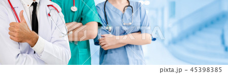 Doctor working in hospital with other doctors. 45398385