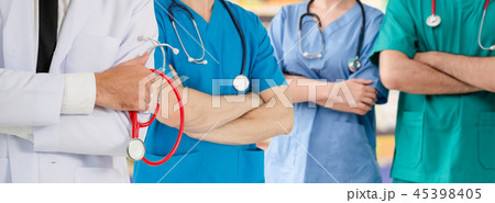 Doctor working in hospital with other doctors. 45398405