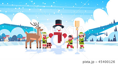 green elves group making snowman merry christmas happy new year banner flat horizontal 45400126