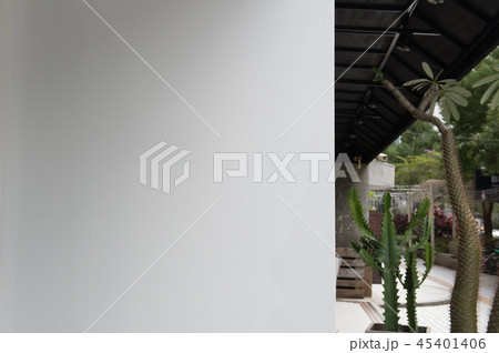 Large blank billboard on a street wall, 45401406