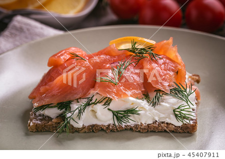 Smoked salmon sandwich closeup Smoked salmon sandwich closeup 45407911