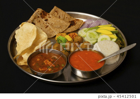 Maharashtrian lunch thali with Amras poli, India  45412501