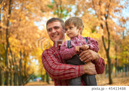 family and children are in autumn city park 45413486