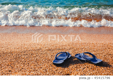 blue Slippers on the beach Lloret de Mar 45415796