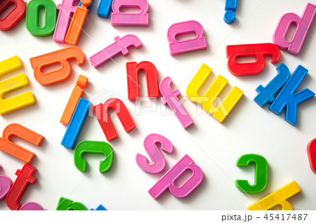 colorful plastic letters on white background 45417487