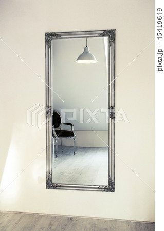 Long mirror on the wall Modern shining interior Long mirror on the wall Modern shining interior 45419649