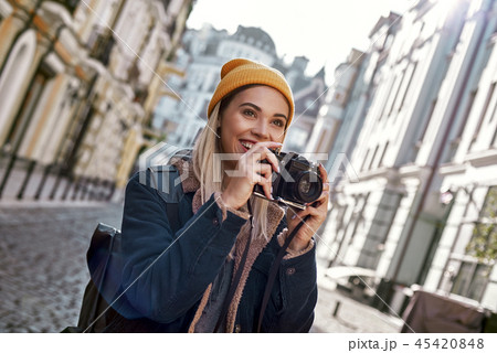 Young tourist blogger is walking with camera in old city 45420848