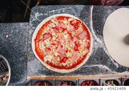 In the kitchen of chef. Master class on cooking pizza 45421409