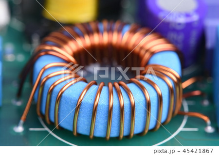 Inductor copper coil on circuit board Inductor copper coil on circuit board 45421867