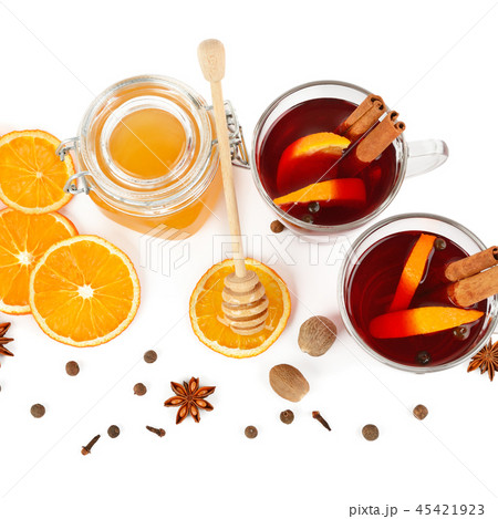 Hot red mulled wine, bee honey slices of oranges Hot red mulled wine, bee honey slices of oranges 45421923