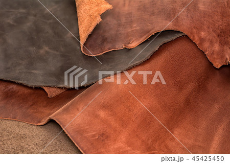 Texture of pieces brown leather. Natural material 45425450