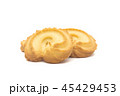 one side of two butter cookies on white background 45429453