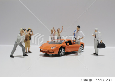 small figure with the toy sport car 45431231