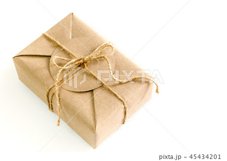 Gift box wrapped in kraft paper and rustic hemp Gift box wrapped in kraft paper and rustic hemp 45434201