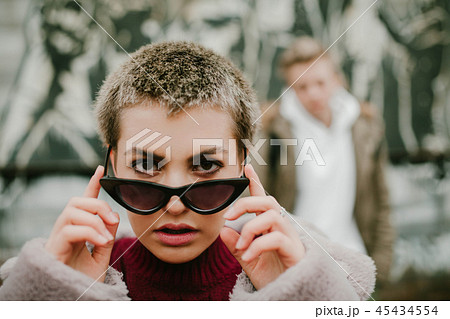 girl clings to sunglasses 45434554