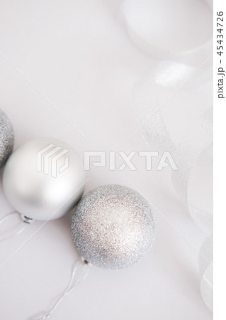 White silver Christmas balls background White silver Christmas balls background 45434726
