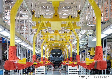 Transfer of car body. Robotic equipment makes Assembly of tcar. Modern car Assembly at factory Transfer of car body. Robotic equipment makes Assembly of tcar. Modern car Assembly at factory 45435387