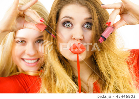 Two women and lip product 45446903