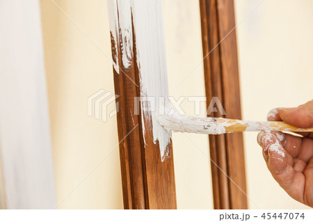 Person renovating wooden hanger Person renovating wooden hanger 45447074