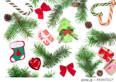 Christmas background with fir branches isolated on white background. Top view. Flat lay Christmas background with fir branches isolated on white background. Top view. Flat lay 45447317