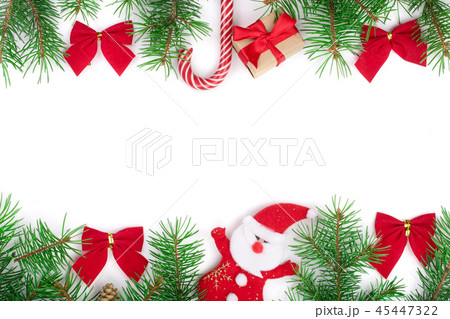 Christmas frame decorated with red bows isolated on white background with copy space for your text Christmas frame decorated with red bows isolated on white background with copy space for your text 45447322