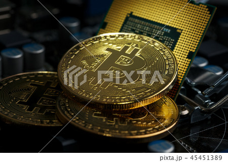 Golden Bitcoin Cryptocurrency on computer circuit  45451389