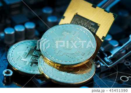 Golden Bitcoin Cryptocurrency on computer circuit  45451390