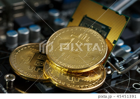 Golden Bitcoin Cryptocurrency on computer circuit  45451391