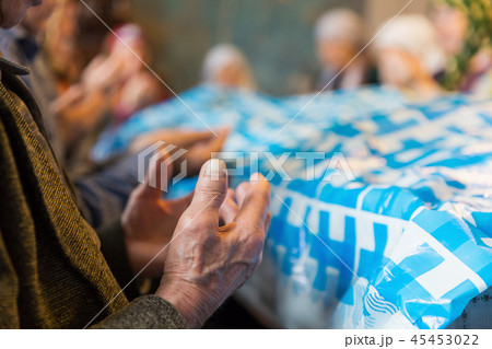 Muslim man hands praying for the salvation of the soul 45453022