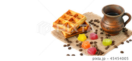 Cup of coffee, waffle and marmalade isolated Cup of coffee, waffle and marmalade isolated 45454005