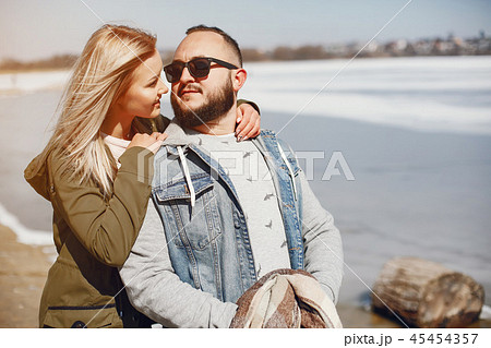 Elegant couple in a winter park Elegant couple in a winter park 45454357