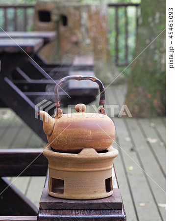 Old kettle put on a fireplace 45461093