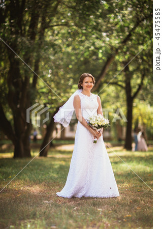 portrait of a young bride with wedding bouquet portrait of a young bride with wedding bouquet 45475585