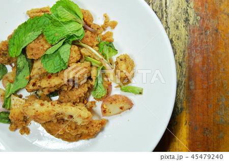 spicy crispy fried chicken salad on dish 45479240
