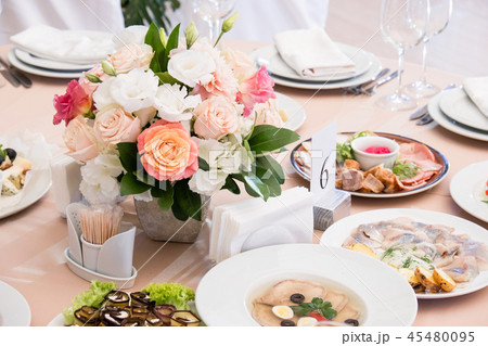 Served for banquet restaurant table with dishes Served for banquet restaurant table with dishes 45480095