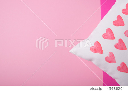 Cute pillow on pink background. Cute pillow on pink background. 45486204