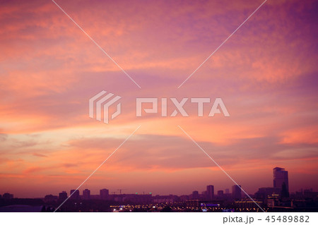 Big metropolis against the backdrop of a beautiful sunset in the fall. Big metropolis against the backdrop of a beautiful sunset in the fall. 45489882