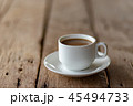 cup of coffee on a wooden table in the morning 45494733