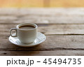 cup of coffee on a wooden table in the morning 45494735