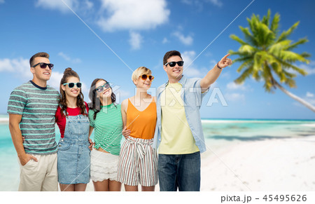 friends in sunglasses over tropical beach friends in sunglasses over tropical beach 45495626